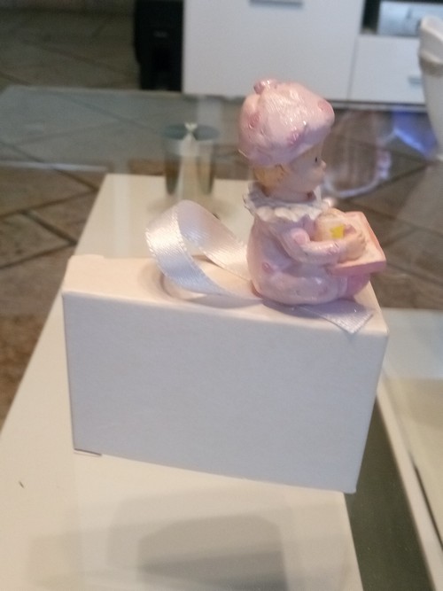 Bamboline portaconfetti in ceramica.